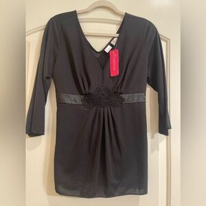 Enchanting black pullover top. Size M